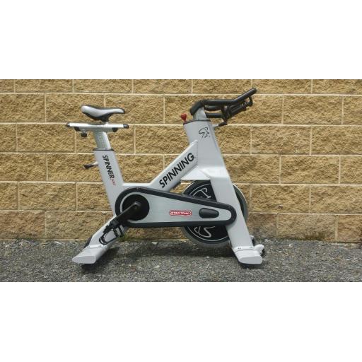 Star Trac NXT 7090 spin bike outside Flair Fitness' Derry Location